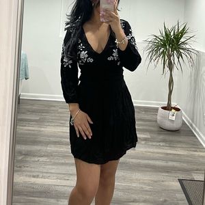 Black long sleeve embroidered floral dress from Francesca’s Jun&Ivy